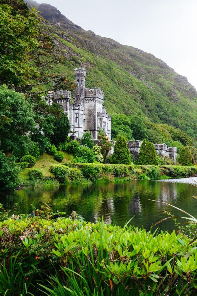 Fascinating vertical shot of the Kylemore Abbey & Victorian Walled Garden in Ireland